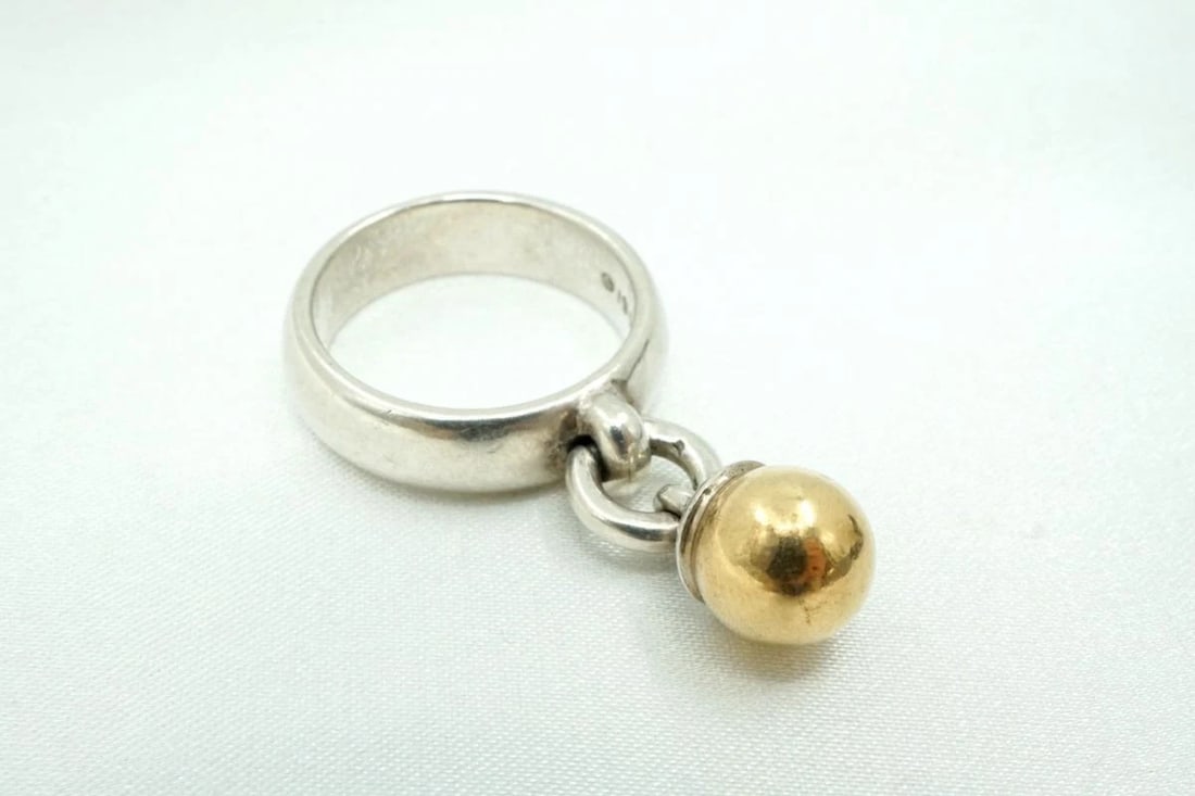 TIFFANY 9 BALL DANGLE RING SV925 750K GOLD SILVER: Tiffany 9 Ball Dangle Ring SV925 750K Gold Silver Brand: Tiffany & Co. Type/Style: Ring Material: SV925 K18YG, Color: Silver YG Size: US 5 Accessories: None Accessories Notice: When purcha