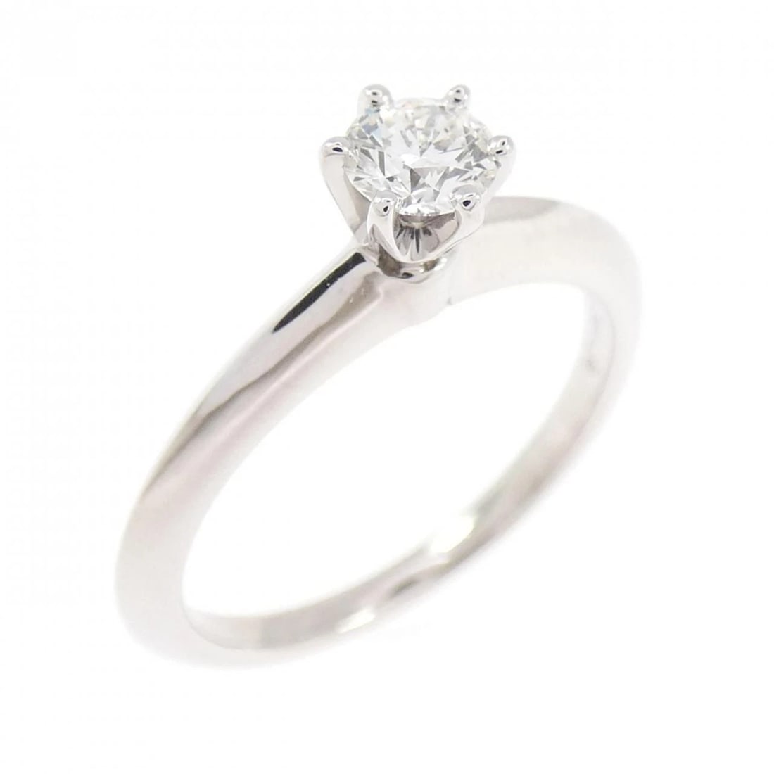 TIFFANY CLASSIC SOLITAIRE RING: Tiffany Classic Solitaire Ring Brand: Tiffany & Co. Type/Style: Ring Material: PT950, Color: PT Size: US 5.75 Accessories: None Accessories Notice: When purchasing pre-owned goods, please