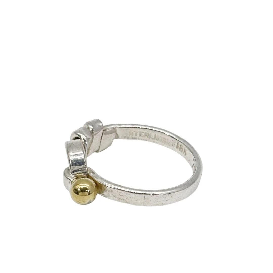 TIFFANY LOVE KNOT RING 925/18K GOLD SILVER: Tiffany Love Knot Ring 925/18K Gold Silver Brand: Tiffany & Co. Type/Style: Ring Material: SV925 K18YG, Color: Silver YG Size: 5.25 US Accessories: None Accessories Notice: When purchasing