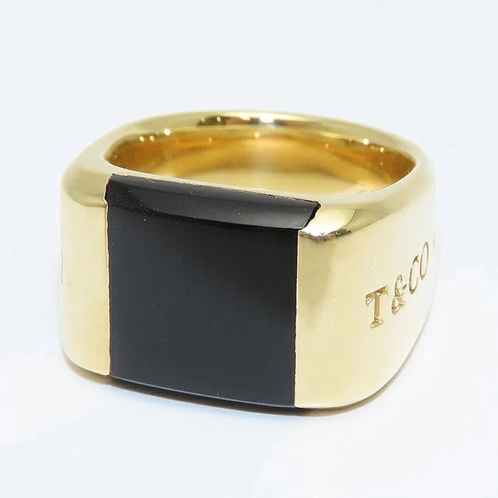 TIFFANY & CO. BLACK ONYX RING 750 GOLD: Tiffany & Co. Black Onyx Ring 750 Gold Brand: Tiffany & Co. Type/Style: Ring Material: K18YG, Main Stone/Creation Onyx Color: Gold Size: US 4.5 Accessories: None Accessories Notice: When purchasing