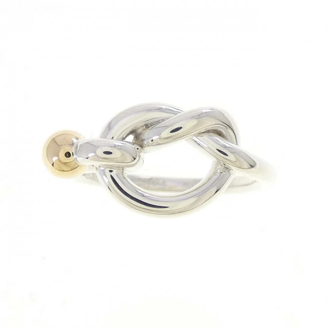 TIFFANY LOVE KNOT RING 925 SILVER & 750 GOLD: Tiffany Love Knot Ring 925 Silver & 750 Gold Brand: Tiffany & Co. Type/Style: Ring Material: SV925 K18YG, Color: Silver YG Size: US 5 Accessories: None Accessories Notice: When purchasing pre-owned