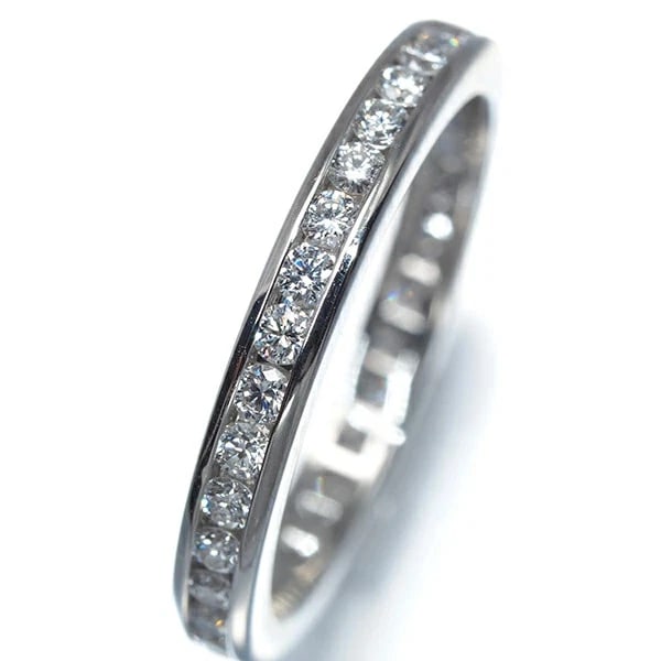 TIFFANY & CO. DIAMOND CHANNEL PLATINUM RING: Tiffany & Co. Diamond Channel Platinum Ring Brand: Tiffany & Co. Type/Style: Ring Material: PT950, Color: PT Size: US 5 Accessories: None Accessories Notice: When purchasing pre-owned goods, please