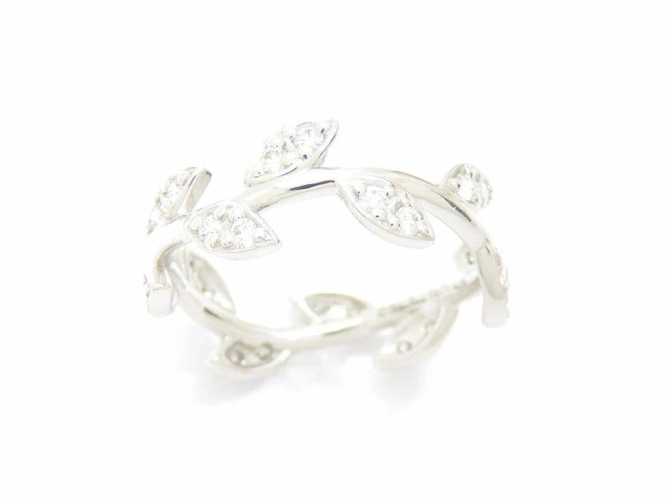TIFFANY K18WG OLIVE LEAF BAND RING: Tiffany K18WG Olive Leaf Band Ring Brand: Tiffany & Co. Type/Style: Ring Material: K18WG, Color: WG Size: 4.75 - 5 US Accessories: None Accessories Notice: When purchasing pre-owned goods,
