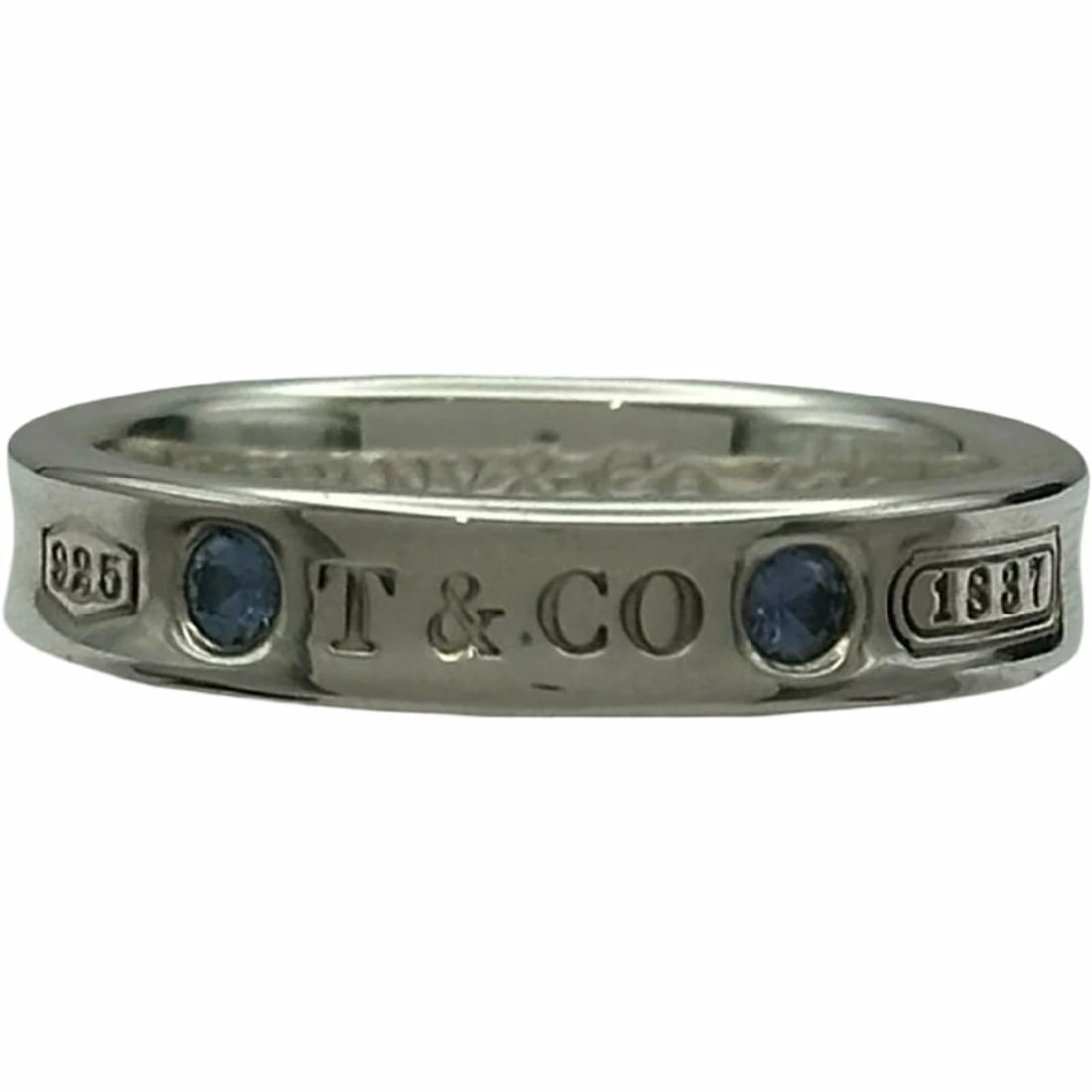 TIFFANY & CO NARROW SILVER AG925 SAPPHIRE LADIES RING: Tiffany & Co Narrow Silver Ag925 Sapphire Ladies Ring Brand: Tiffany & Co. Type/Style: Ring Material: Ag925, Main Stone/Creation Sapphire Color: Silver Size: 6 US Accessories: None Accesso