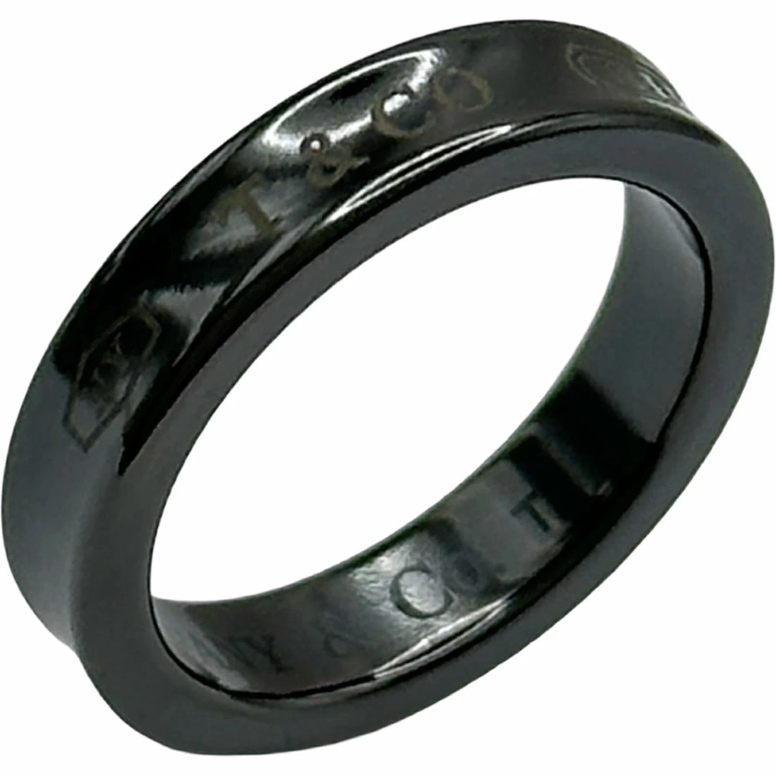 TIFFANY NARROW BLACK TITANIUM RING: Tiffany Narrow Black Titanium Ring Brand: Tiffany & Co. Type/Style: Ring Material: Black Titanium, Color: Black Size: US 5 ? Accessories: None Accessories Notice: When purchasing pre-owned goods,