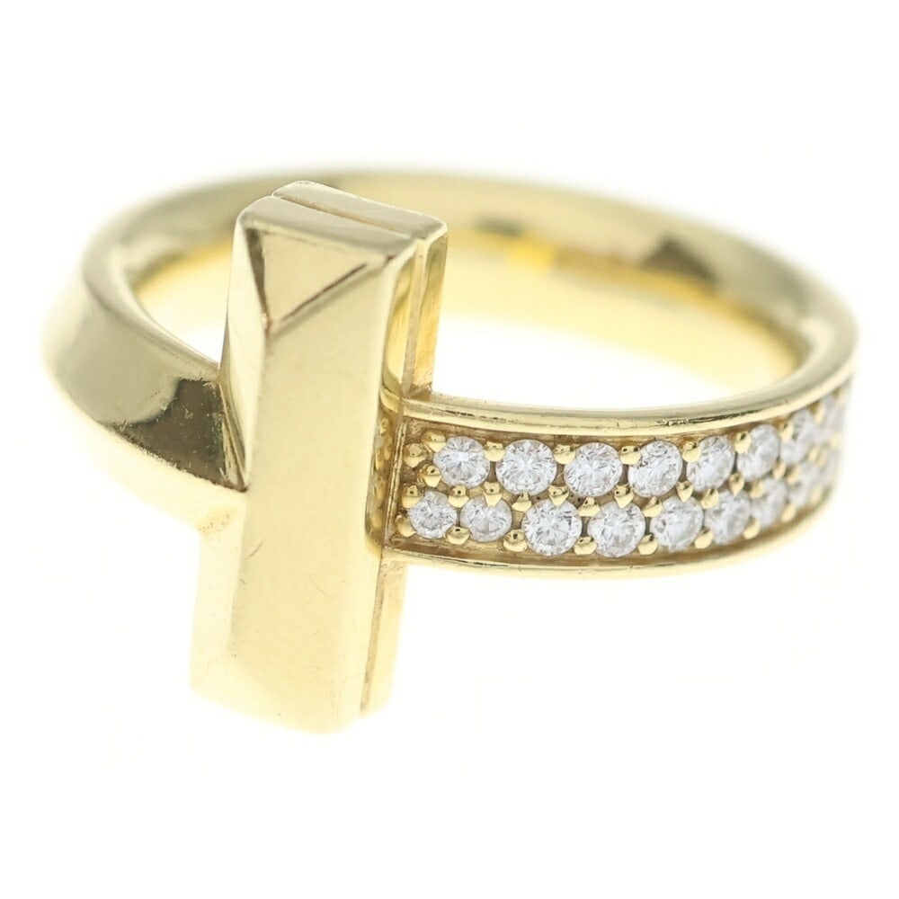 TIFFANY & CO. T ONE DIAMOND GOLD RING: Tiffany & Co. T One Diamond Gold Ring Brand: Tiffany & Co. Type/Style: Ring Material: Au750YG, Color: Gold Size: US 5.5.5 Accessories: None Accessories Notice: When purchasing pre-owned go