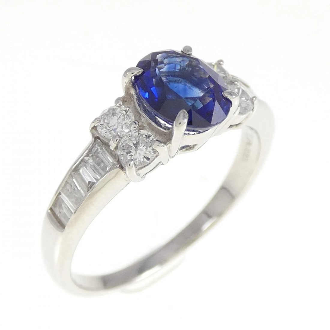 PT900 SAPPHIRE RING: PT900 Sapphire Ring Brand: Unbranded Type/Style: Sapphire Ring Material: Platinum900, Main Stone/Creation Sapphire Secondary Stone Diamond Color: Platinum Size: US 6 3/4 Accessories: None Accessories