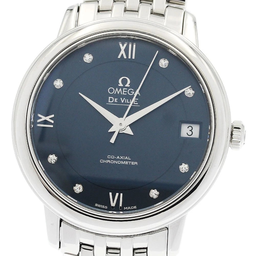 OMEGA DE VILLE PRESTIGE COAXIAL WATCH: OMEGA De Ville Prestige Coaxial Brand: OMEGA Type/Style: Wristwatch Material: Band Material Stainless Steel, Case Material Stainless Steel Color: Band Color Silver, Case Color Silver, Dial Color Navy 