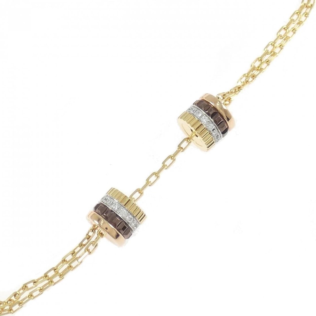 BOUCHERON QUATRE CLASSIC 2 MOTIF BRACELET: Boucheron Quatre Classic 2 Motif Bracelet Brand: Boucheron Type/Style: Boucheron Bracelet Material: 750 Yellow Gold / 750 White Gold / 750 Pink Gold / PVD, Main Stone Natural Color: Yellow Gold /