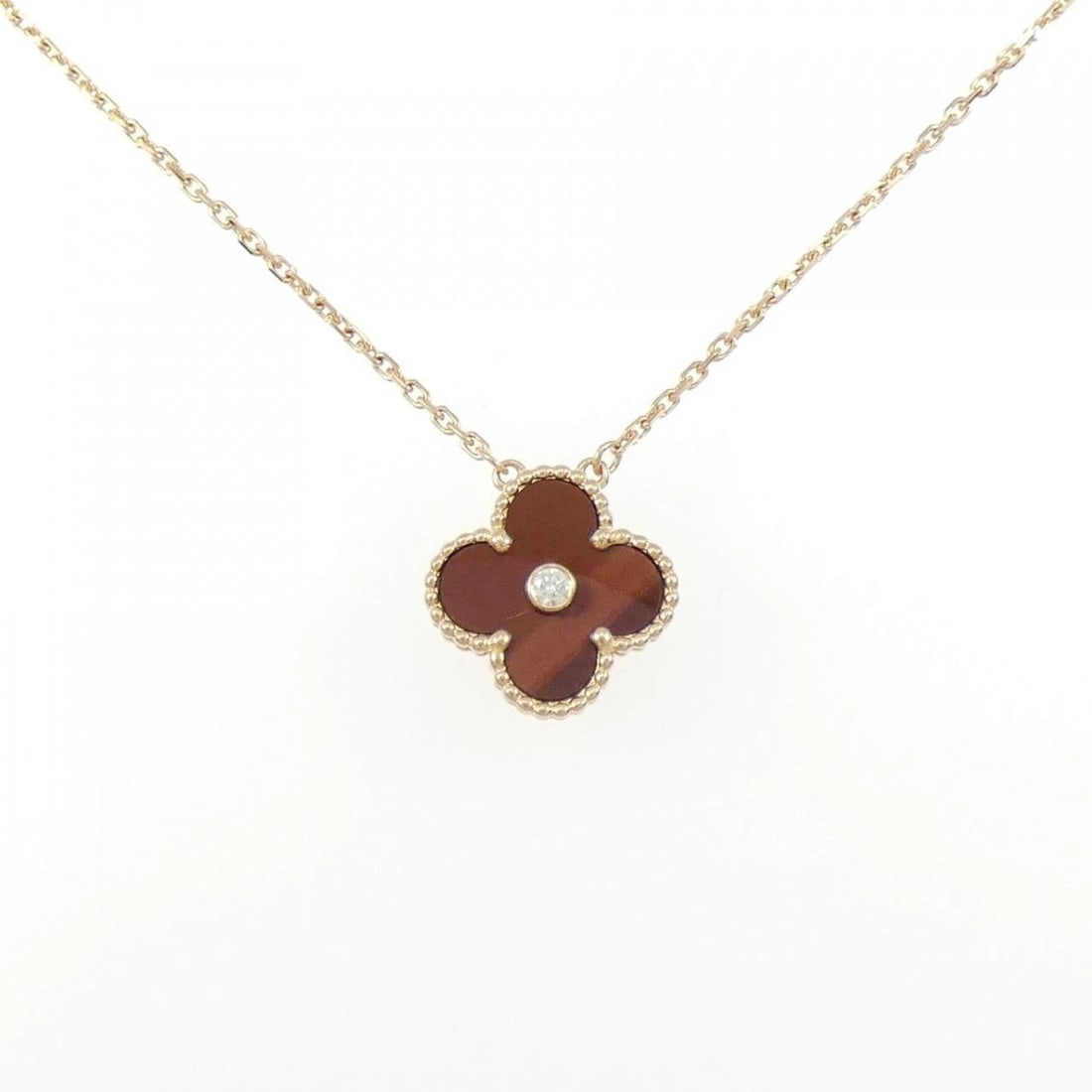VAN CLEEF & ARPELS ALHAMBRA HOLIDAY: Van Cleef & Arpels Alhambra Holiday Brand: Van Cleef & Arpels Type/Style: Van Cleef & Arpels Necklace Material: 750 Pink Gold, Main Stone Bullseye Color: Pink Gold Size: lentgh 38?43cm Actual Size