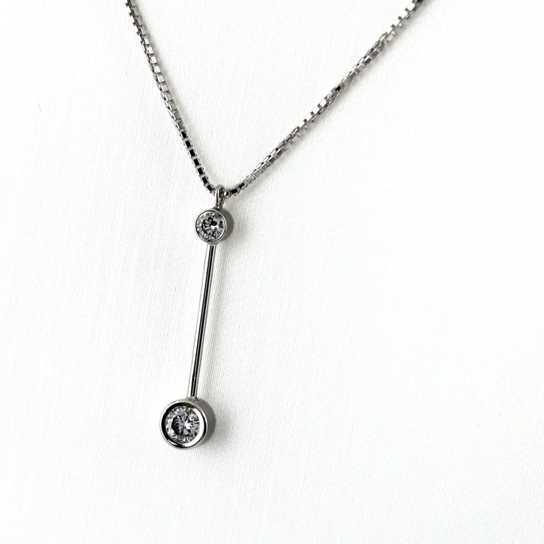 MELEE DIAMOND DESIGN NECKLACE: melee diamond design necklace Brand: Unbranded Type/Style: Necklace Material: Pt850, Color: PT Size: Chain / code 40cm(15.7") Total length of the pendant head including a bail 25.0?4.7mm(1.0") Acc