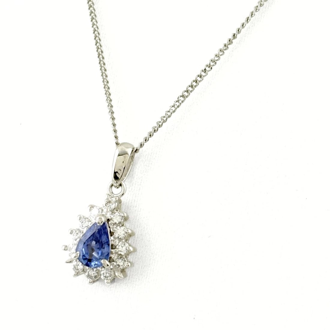 SAPPHIRE DESIGN NECKLACE PLATINUM PENDANT: Sapphire design necklace Platinum Pendant Brand: Unbranded Type/Style: Necklace Material: Pt900, Main Stone Sapphire Color: PT Size: Chain / code 42cm(16.5") Total length of the pendant head including