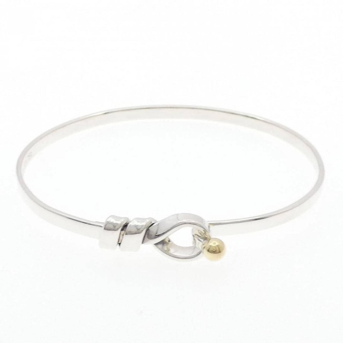 TIFFANY & CO. HOOK & EYE BANGLE: TIFFANY & Co. Hook & Eye Bangle Brand: TIFFANY&Co. Type/Style: TIFFANY & Co. bracelet Material: 925Silver/750Yellow Gold, Color: Silver/ Yellow Gold Size: Lenght 17cm Actual Size Max width approx: