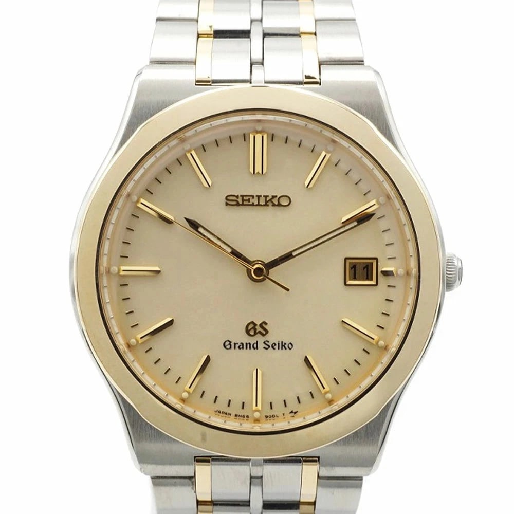 GRAND SEIKO QUARTZ STAINLESS STEEL YELLOW GOLD WATCH: Grand Seiko Quartz Stainless Steel Yellow Gold Watch Brand: SEIKO Type/Style: Wristwatch Material: Stainless Steel + 18K Yellow Gold Color: Silver dial Size: Case size: 36mm Wrist size: 16.0cm Acc