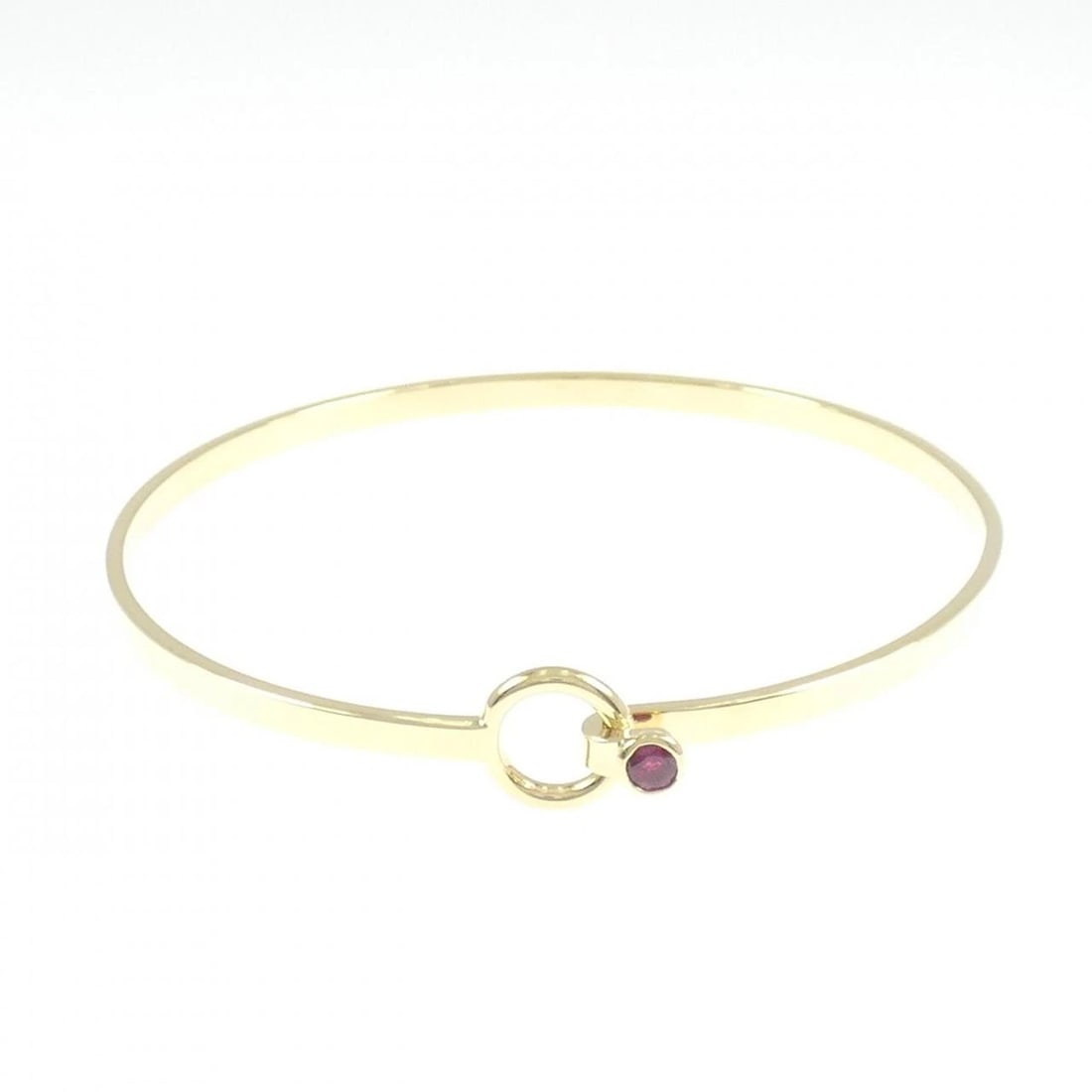 TIFFANY&CO. RUBY BANGLE: TIFFANY&Co. Ruby Bangle Brand: TIFFANY&Co. Type/Style: TIFFANY & Co. Bracelet Material: 750 yellow gold, Main Stone Ruby Color: Yellow Gold Size: 17.5cm Actual Size Max width approx: 9.2mm
