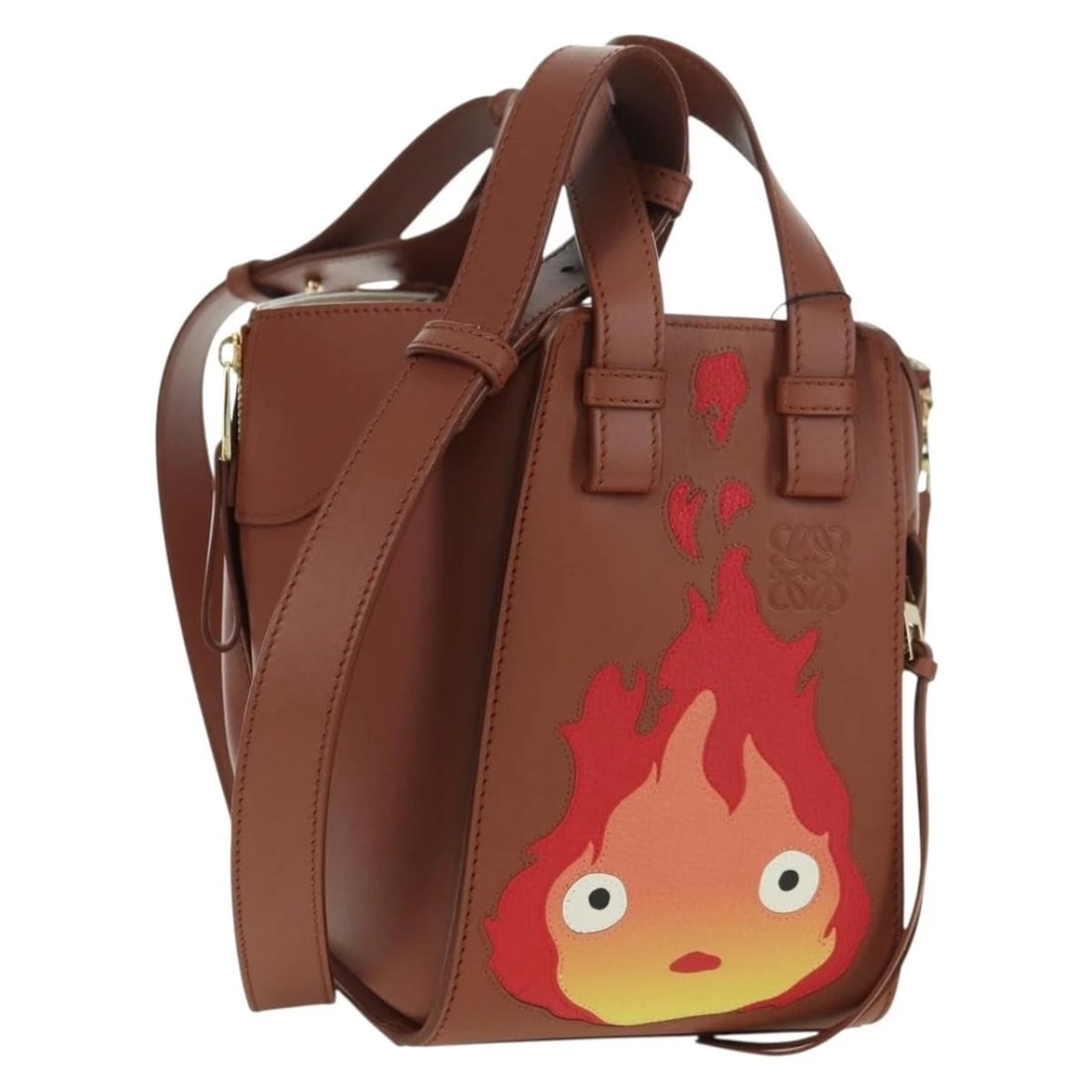 LOEWE ? GHIBLI HOWL'S HAMMOCK CALCIFER BAG LEATHER 2WAY GOLD: LOEWE ? Ghibli Howl's Hammock Calcifer Bag Leather 2way Gold Brand: LOEWE Type/Style: Hand Bag Material: Leather Color: Brown/Gold Size: Size(Inch) W9.1 x H7.9 x D5.5inch(Approx) Handle Drop:3.9inch(A