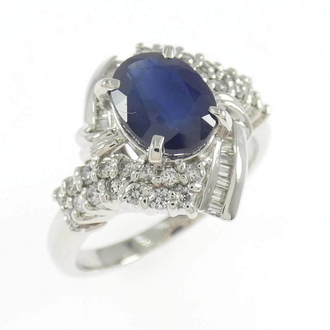 PT900 SAPPHIRE RING: PT900 Sapphire Ring Brand: Unbranded Type/Style: Sapphire Ring Material: Platinum900, Main Stone Sapphire Secondary Stone Diamond Color: Platinum Size: US 7 Accessories: None Accessories Notice: When
