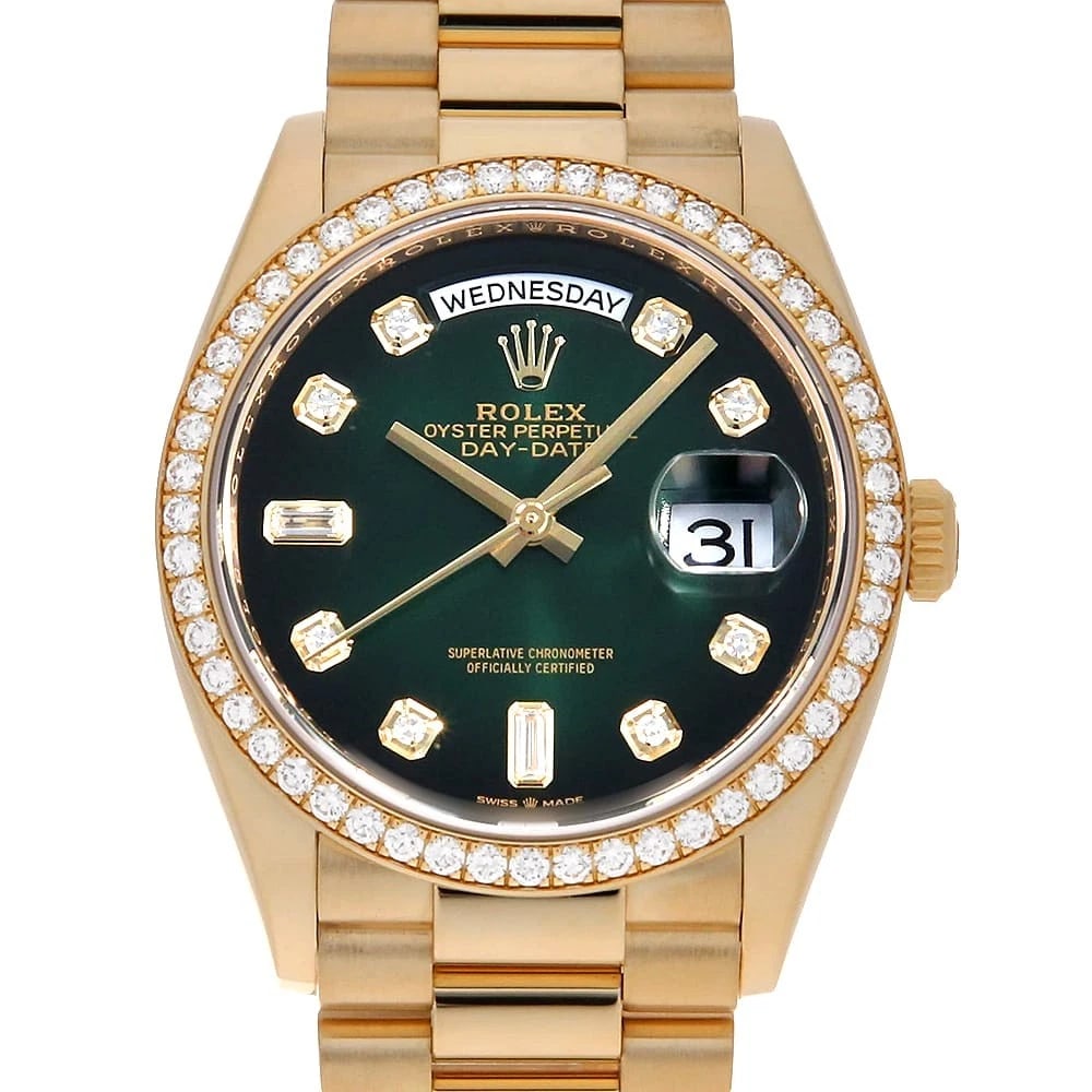 ROLEX BEZEL DIAMOND BAGUETTE WATCH: ROLEX Bezel Diamond Baguette Brand: ROLEX Type/Style: Wrist watch Material: Band Material Yellow Gold, Case Material Yellow Gold Color: Dial Color Green Size: Case Size Case:W36mm Circumference of Wri
