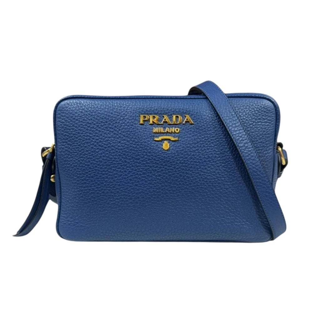PRADA SHOULDER BAG CROSS BODY LEATHER: PRADA Shoulder Bag Cross Body leather Brand: PRADA Type/Style: Shoulder Bag Material: Exterior Material leather Color: Exterior Color blue Size: W8.9 x H6.3 x D3.7inch Accessories: None Ac