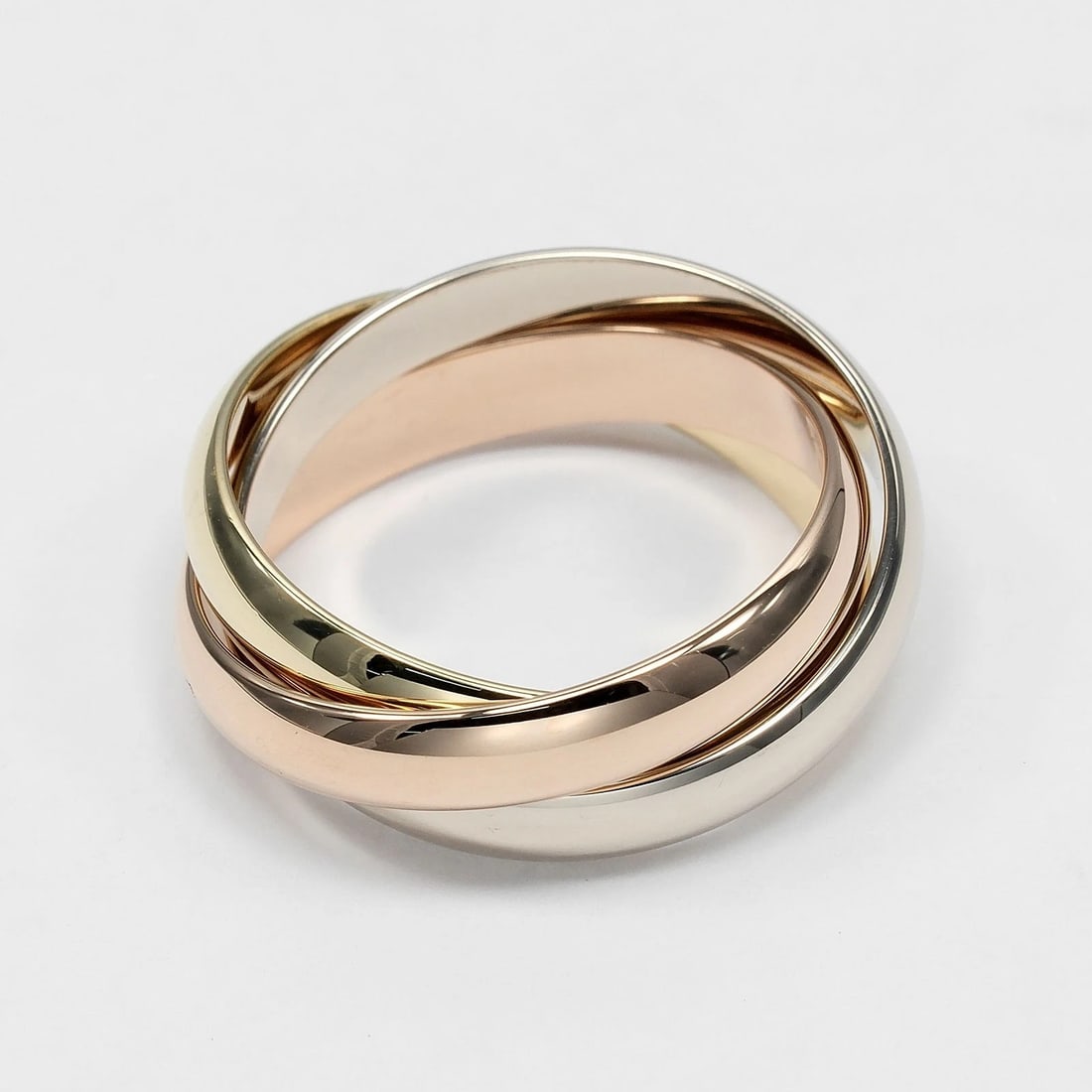 CARTIER TRINITY RING BAND K18 GOLD: CARTIER Trinity Ring band K18 Gold Brand: CARTIER Type/Style: Ring Material: K18 Gold (YGxPGxWG), Color: Gold Size: 6.0 US Accessories: None Accessories Notice: When purchasing pre-owned g