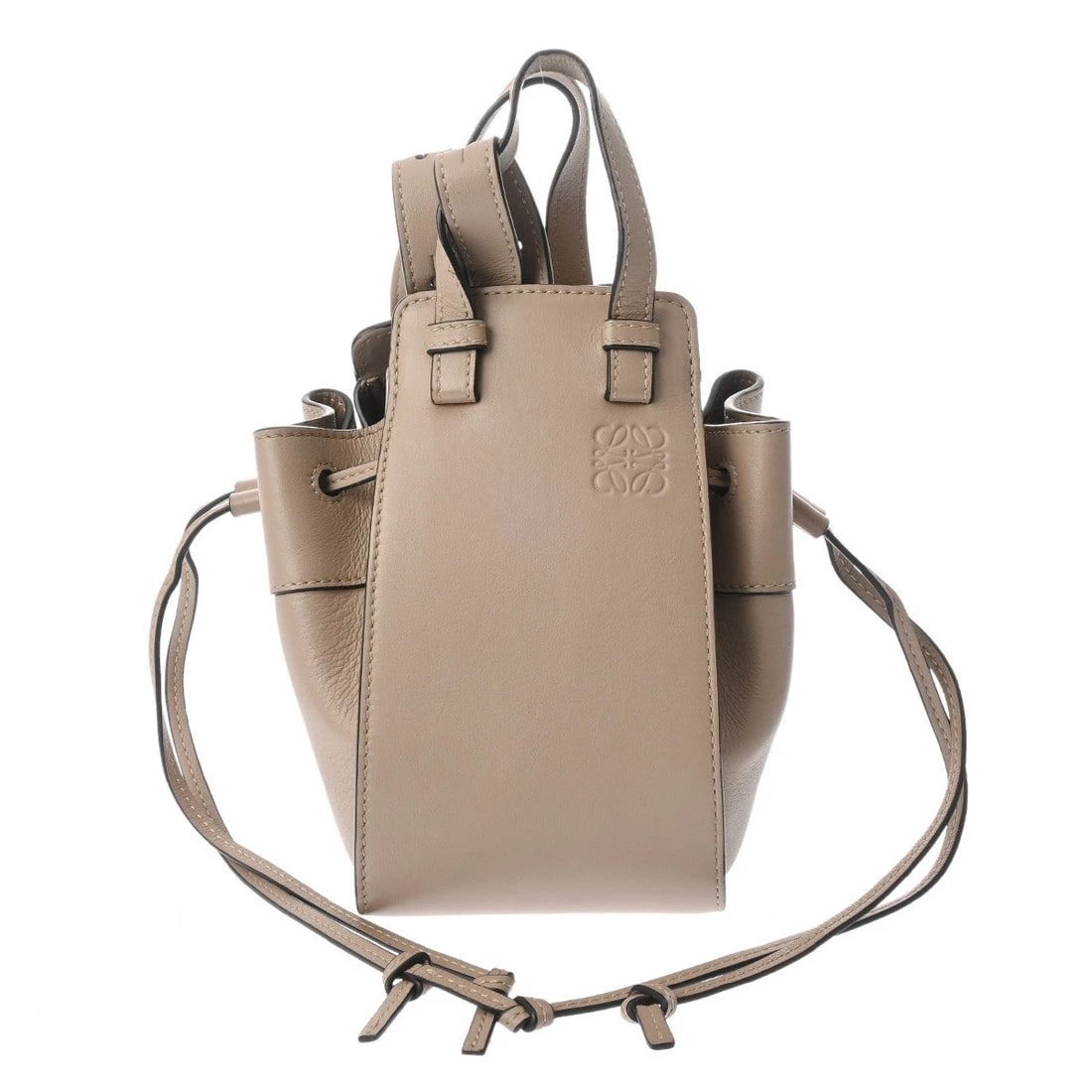 LOEWE MINI HAMMOCK DRAWSTRING BAG SHOULDER BAG: LOEWE mini hammock drawstring bag Shoulder Bag Brand: LOEWE Type/Style: Shoulder Bag Material: Classic calf Color: sand Size: H:about 7.5inch (maximum) W:about 7.1inch (maximum) D:about 4.1inch (Botto