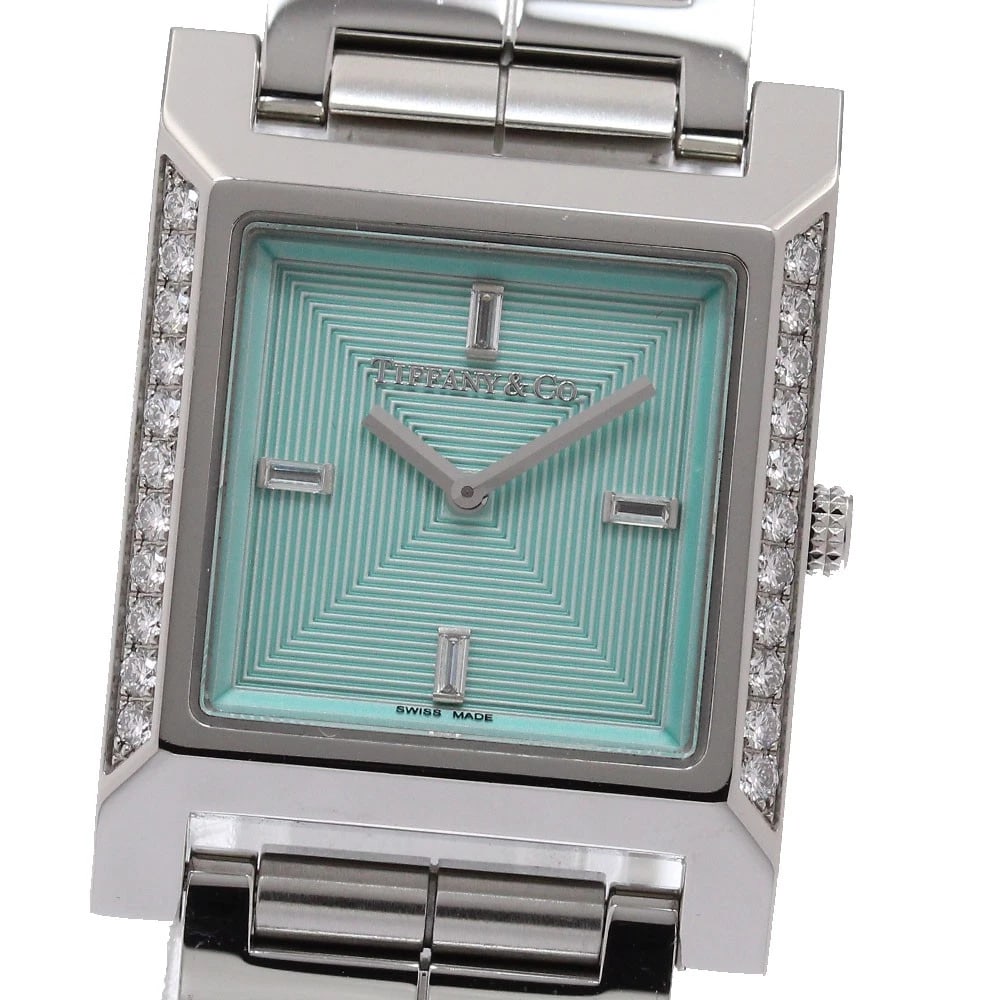 TIFFANY&CO. MAKERS SQUARE DIAMOND BEZEL QUARTZ WATCH: TIFFANY&Co. Makers Square Diamond Bezel Quartz Watch Brand: TIFFANY&Co. Type/Style: Wristwatch Material: Band Material Stainless Steel, Case Material Stainless Steel Color: Band Color Silver, Case Col