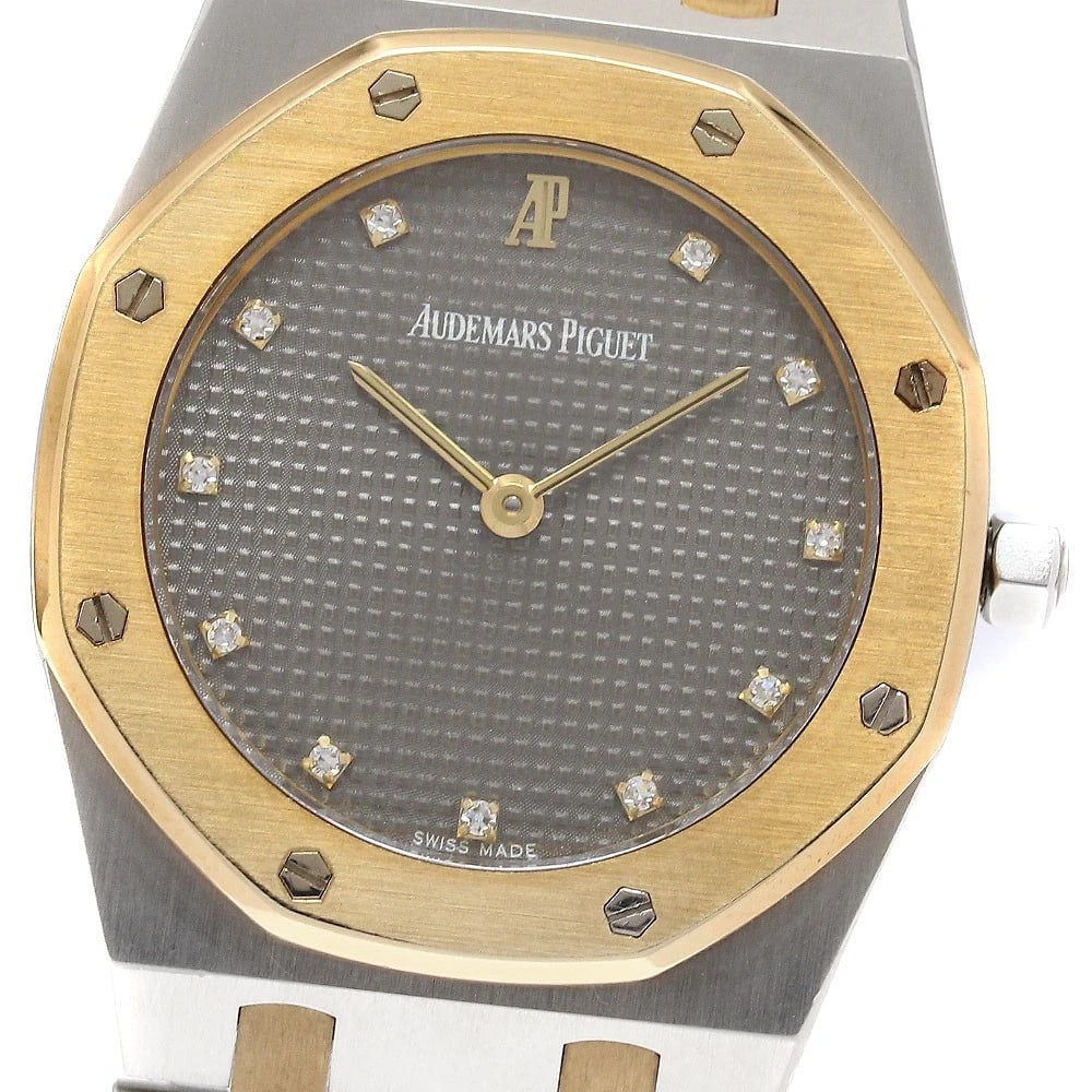 AUDEMARS PIGUET ROYAL OAK DIAMOND TONE QUARTZ WATCH: AUDEMARS PIGUET Royal Oak Diamond Tone Quartz Watch Brand: AUDEMARS PIGUET Type/Style: Wristwatch Material: Band Material Stainless Steel/YG, Case Material Stainless Steel/YG Color: Band Color Silver 