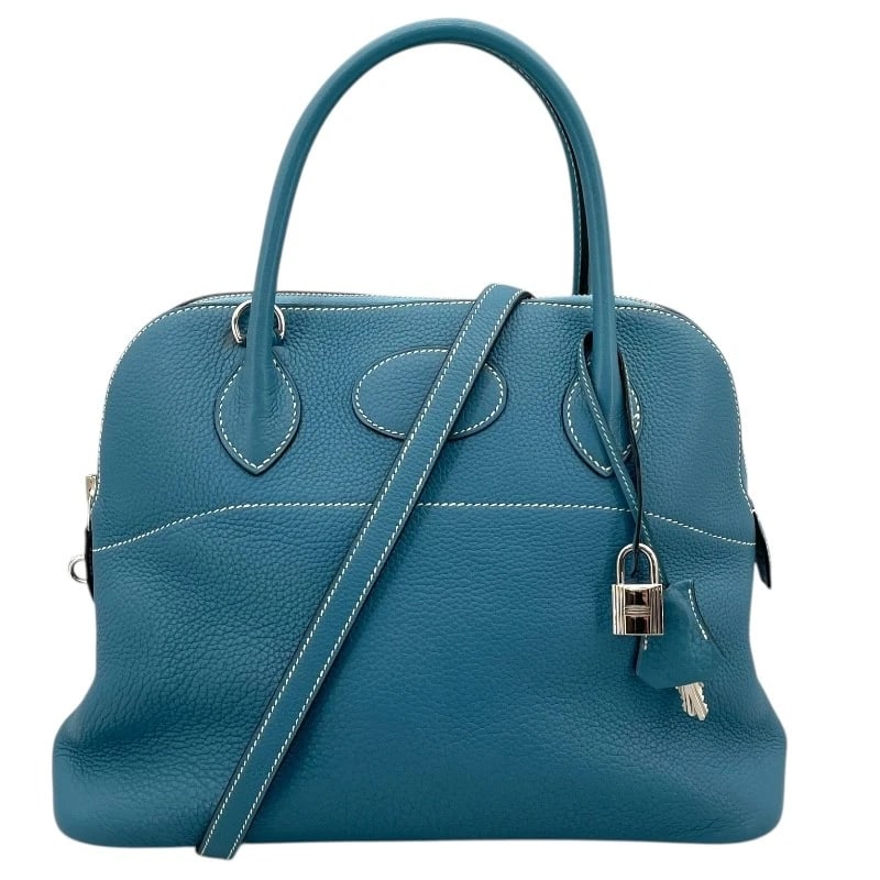 HERMES BORED 31 HANDBAG: HERMES Bored 31 Handbag Brand: HERMES Type/Style: Handbag Material: Taurillon Clemence Color: Blue Jean SVHardware Size: W12.2 x H9.6 x D4.7inch Accessories: None Accessories Notice: When