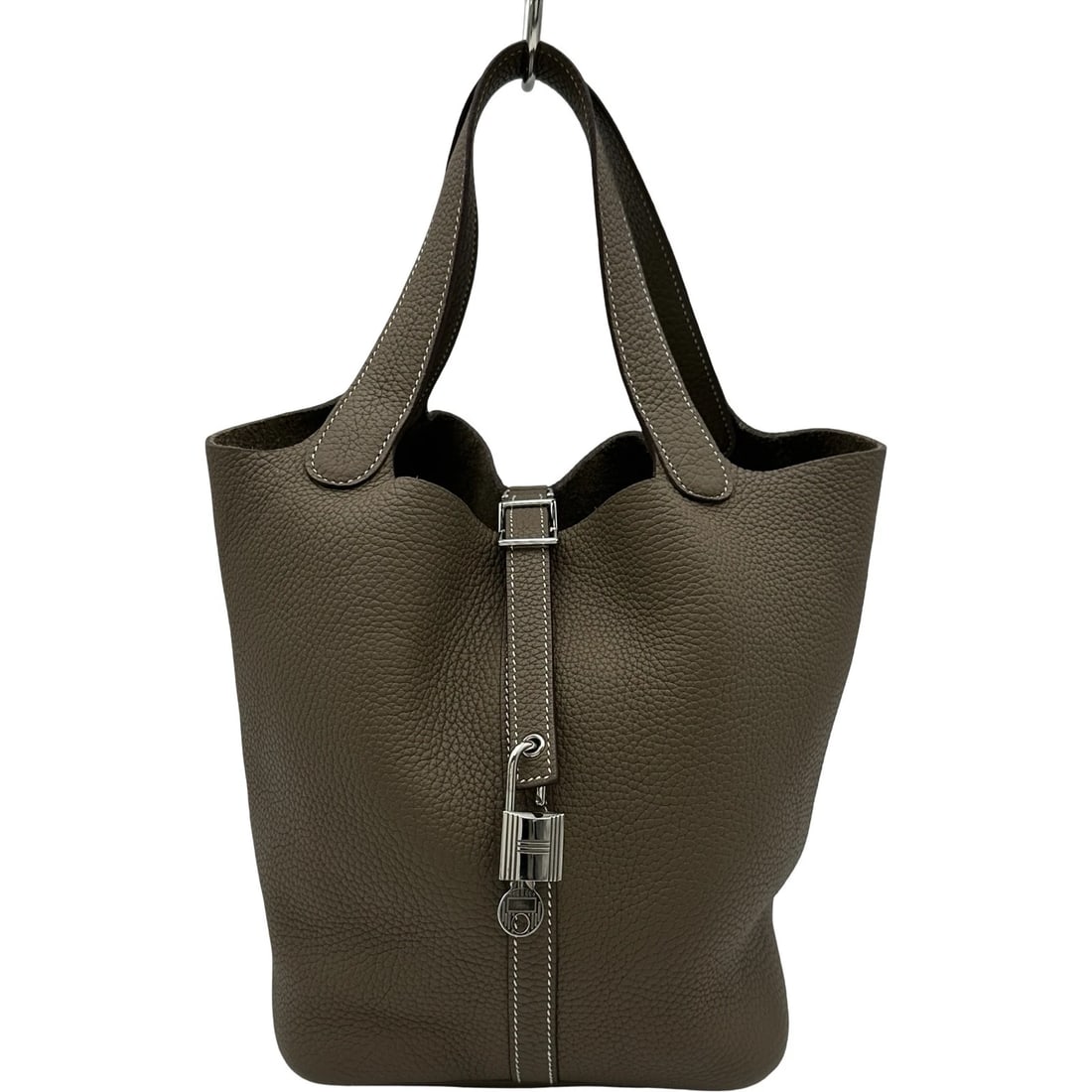 HERMES PICO TAN LOCK MM HANDBAG: HERMES Pico Tan Lock MM Handbag Brand: HERMES Type/Style: Handbag Material: Taurillon Clemence Color: Etop SilverHardware Size: W8.7 x H8.7 x D6.7inch Accessories: None Accessories Notice: