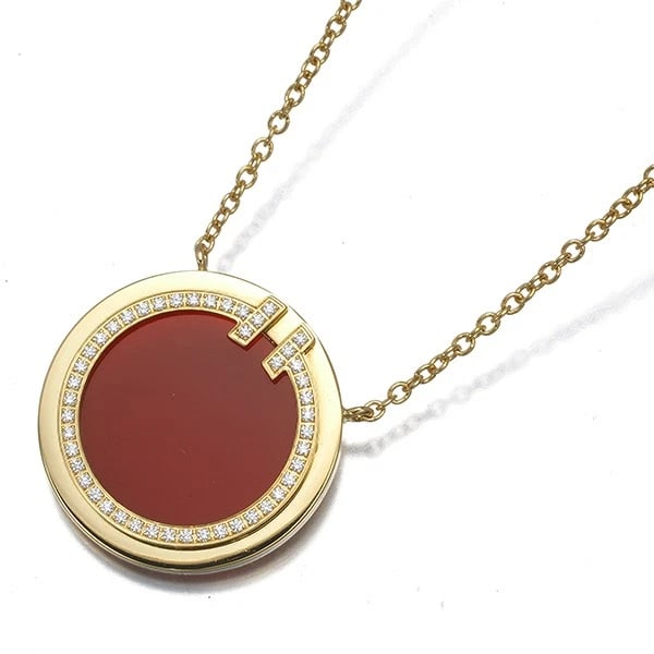 TIFFANY&CO. CARNELIAN DIAMOND TIFFANY T CIRCLE NECKLACE 18K YG: Tiffany&Co. Carnelian Diamond Tiffany T Circle Necklace 18K YG Brand: Tiffany & Co. Type/Style: Necklace Material: 18K YG Main Stone Natural Color: Yellow Gold Size: Necklace length: 40 / 46cmPendant 