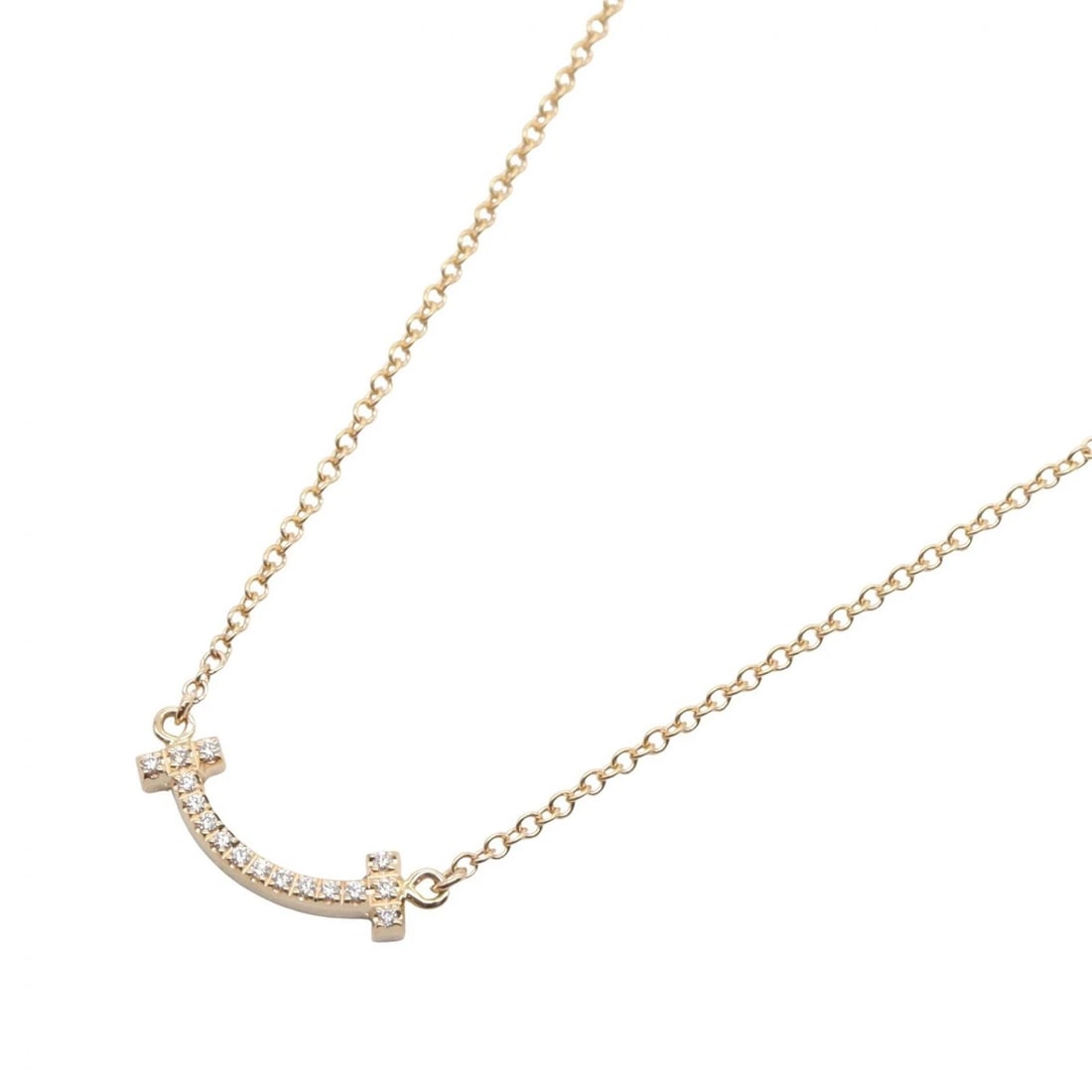 TIFFANY?CO T SMILE MINI DIAMOND NECKLACE PENDANT: TIFFANY?CO T Smile Mini Diamond Necklace Pendant Brand: TIFFANY?CO Type/Style: Necklace Material: K18PG?Rose Gold? Main Stone Natural Color: Gold Size: Neck rotation?40.5/45.5cm(15.9") Motif W?13mm x 