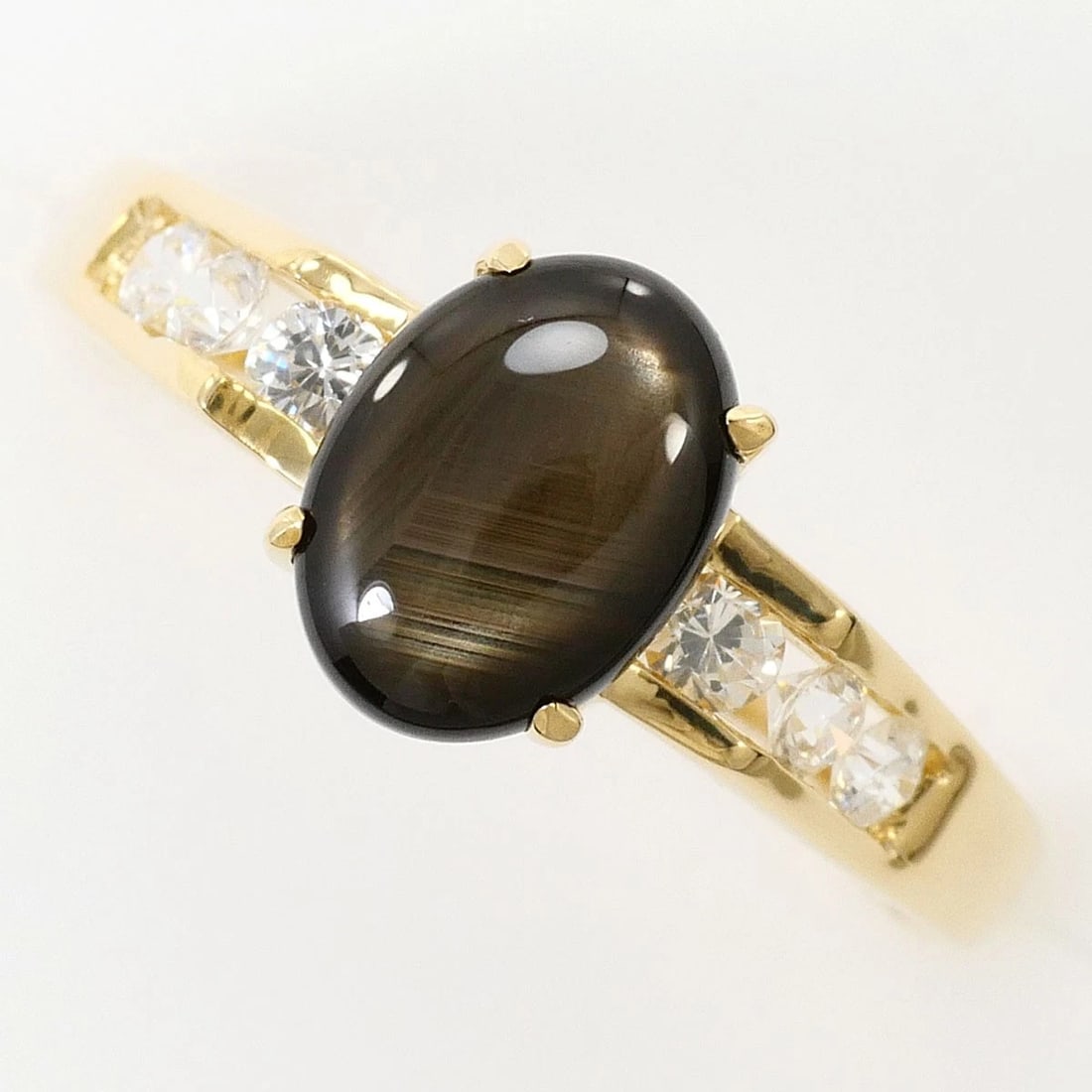14K GOLD RING BLACK STAR SAPPHIRE: 14K Gold Ring Black Star Sapphire Brand: No Brand Type/Style: Ring Material: 14k Gold, Main Stone/Creation Black Star Sapphire Color: Gold Size: US 5 7/8 Accessories: None Accessories Noti