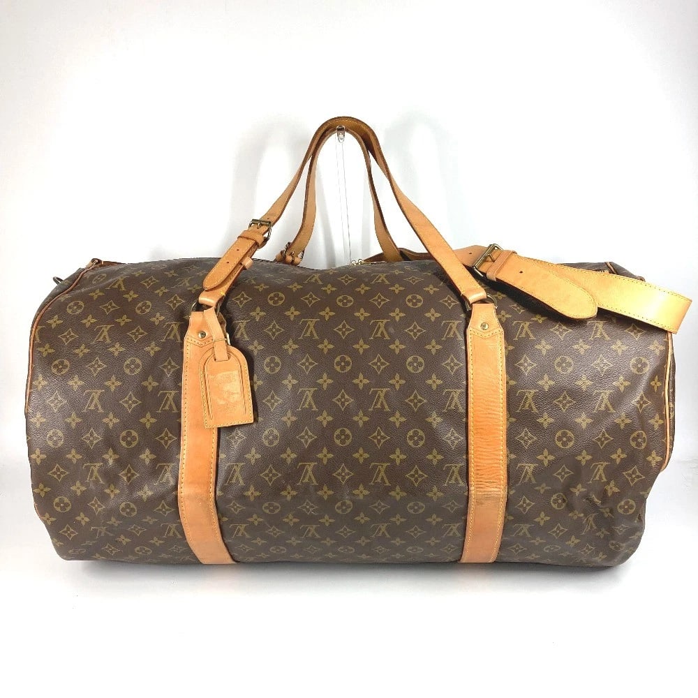 LOUIS VUITTON MONOGRAM SAC VERSION BAG: LOUIS VUITTON Monogram Sac version Bag Brand: LOUIS VUITTON Type/Style: Duffle Bag Material: MonogramCanvas Color: Brown Size: W26.8?H15.4?D8.7inch / W68cm H39cm D22cm Accessories: None Ac