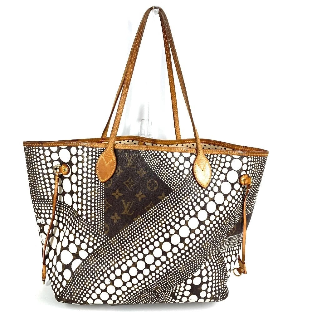 LOUIS VUITTON MONOGRAM PUMPKIN DOT NEVERFULL MM TOTE BAG: LOUIS VUITTON Monogram Pumpkin Dot Neverfull MM Tote Bag Brand: Louis Vuitton Type/Style: Shoulder Bag Material: MonogramCanvas Color: Brown / White Size: W12.2?H11.0?D6.1inch / W31cm H28cm D15.5cm