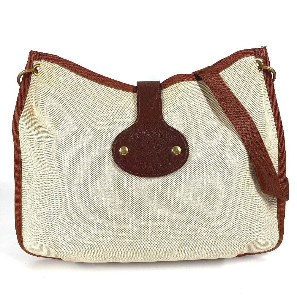 HERMES RODEO BAG CROSSBODY POCHETTE SHOULDER BAG: HERMES Rodeo Bag Crossbody Pochette Shoulder Bag Brand: HERMES Type/Style: Shoulder Bag Material: Toile H Color: Beige Size: W13.0?H11.4inch / W33cm H29cm Accessories: None Accessories Not