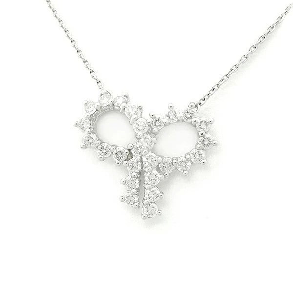 TIFFANY & CO. DIAMOND RIBBON BOW NECKLACE: Tiffany & Co. Diamond Ribbon Bow Necklace Brand: Tiffany & Co. Type/Style: Necklace Material: Pt950 Color: Pt Size: Chain Length: 15.9 inches (40.5 cm) Pendant Size: 0.83 inches (21.0 mm) ? 0.68 inche