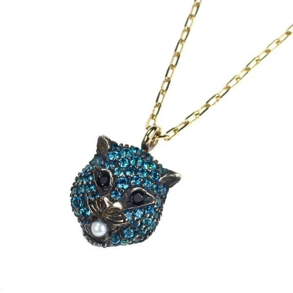 GUCCI SV/K18YG BLUE TOPAZ BLACK PEARL PENDANT NECKLACE: Gucci SV/K18YG Blue Topaz Black Pearl Pendant Necklace Brand: Gucci Type/Style: pendant necklace Material: K18YG, Main Stone/Creation Topaz Side Stone black spinel baby pearl Color: YG Size: Necklace: