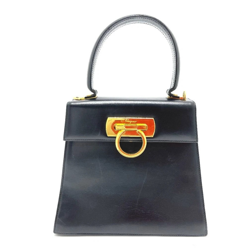 SALVATORE FERRAGAMO GANCINI 2WAY HAND BAG: SALVATORE FERRAGAMO Gancini 2WAY Hand Bag Brand: Salvatore Ferragamo Type/Style: Shoulder Bag Material: Leather Color: Black x Gold Hardware Size: W8.0?H7.3?D3.5inch / W20.3cm H18.5cm D9cm Accesso