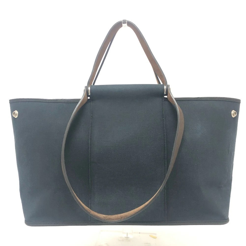 HERMES KAVAC ELAN PM SHOULDER BAG TOTE BAG: HERMES Kavac Elan PM Shoulder Bag Tote Bag Brand: HERMES Type/Style: Tote Bag Material: Leather/Canvas Color: Black/silver hardware Size: W19.3?H9.3?D6.1inch / W49cm H23.5cm D15.5cm Handle: 25.2inch /