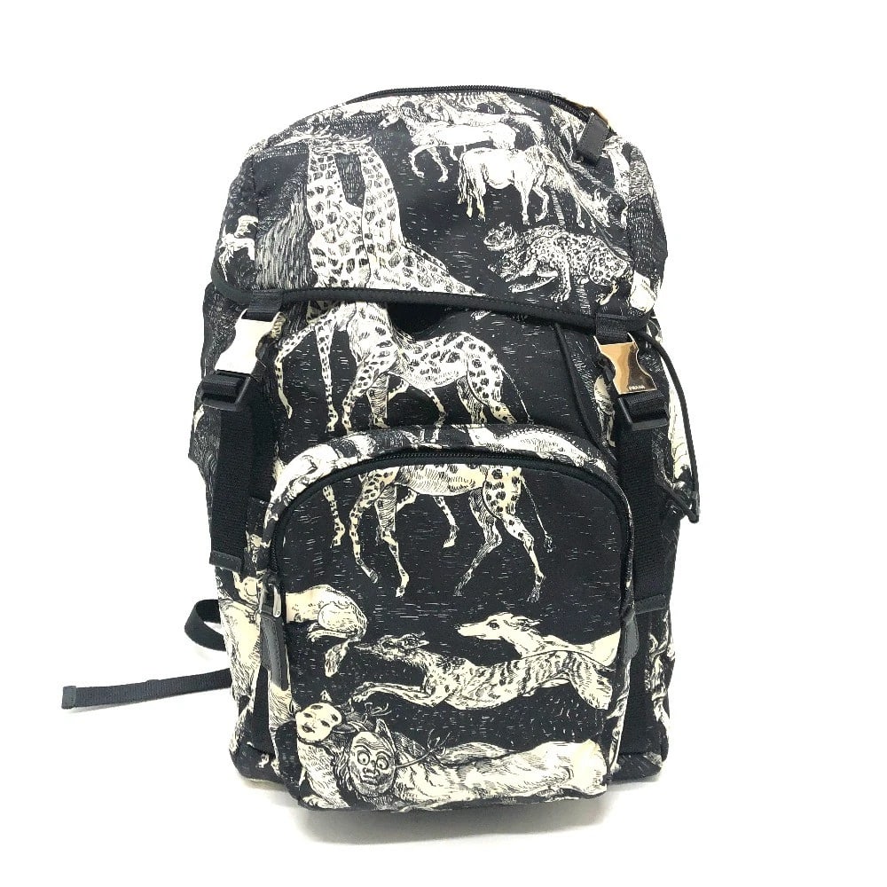 PRADA ANIMAL TOTAL PATTERN BACKPACK BAG: PRADA Animal total pattern Backpack Bag Brand: PRADA Type/Style: Backpack Material: Nylon Color: Black / White SilverHardware Size: W11.8?H17.3?D6.9inch / W30cm H44cm D17.5cm Accessories: None