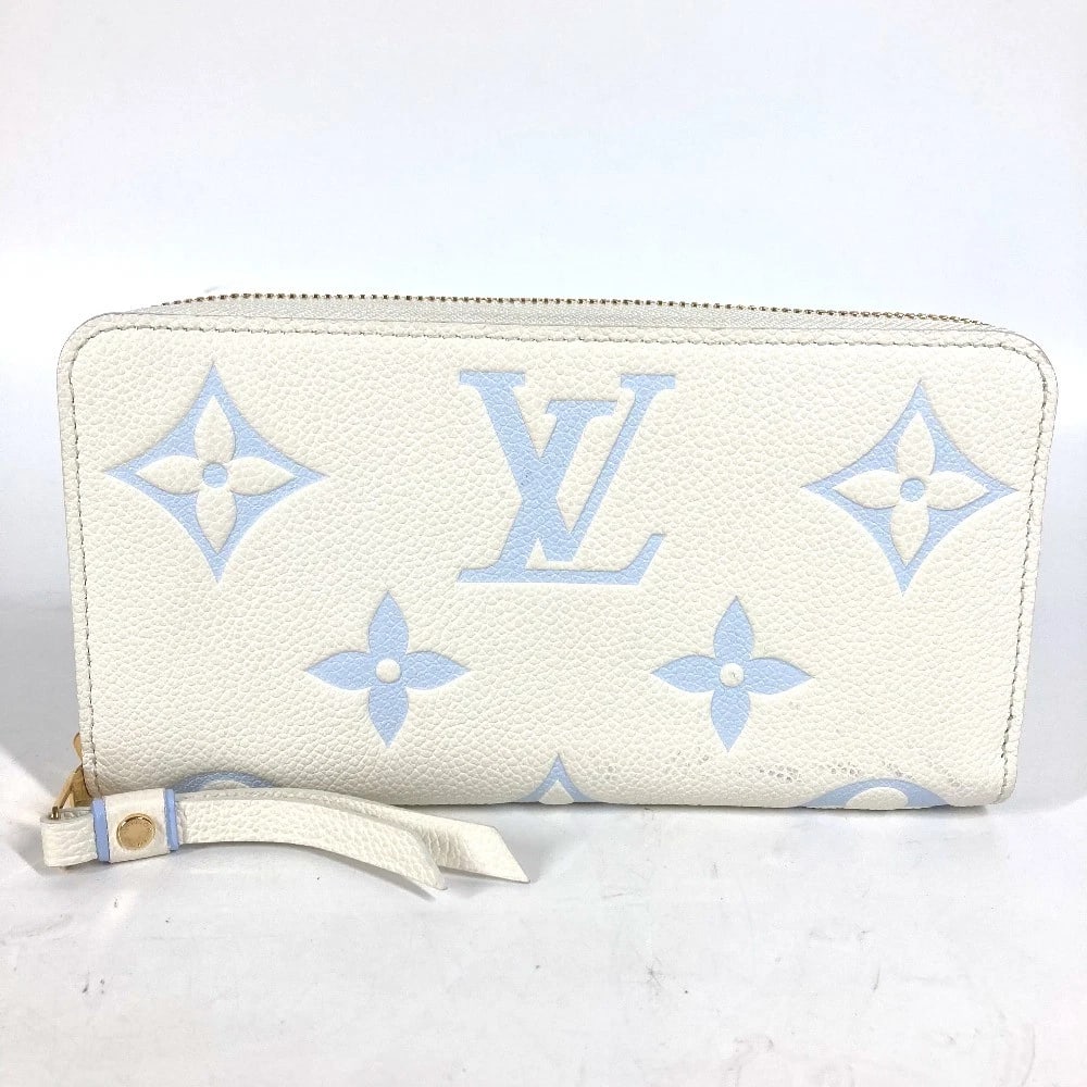 LOUIS VUITTON MONOGRAMEMPREINTE ZIPPY WALLET: LOUIS VUITTON MonogramEmpreinte Zippy Wallet Brand: LOUIS VUITTON Type/Style: Long Wallet Material: MonogramEmpreinteLeather Color: Latte White/Candy Blue / bluexWhite Size: W7.7?H4.1inch / W19.5cm H1