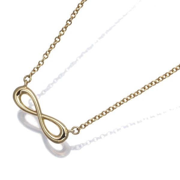 TIFFANY&CO. INFINITY NECKLACE 18K 750 YELLOW GOLD: Tiffany&Co. Infinity Necklace 18K 750 Yellow Gold Brand: Tiffany & Co. Type/Style: Necklace Material: 18K 750 Yellow Gold Color: Yellow Gold Size: Necklace length: 41 / 46cmPendant size: 4.3 x 14.5mm 