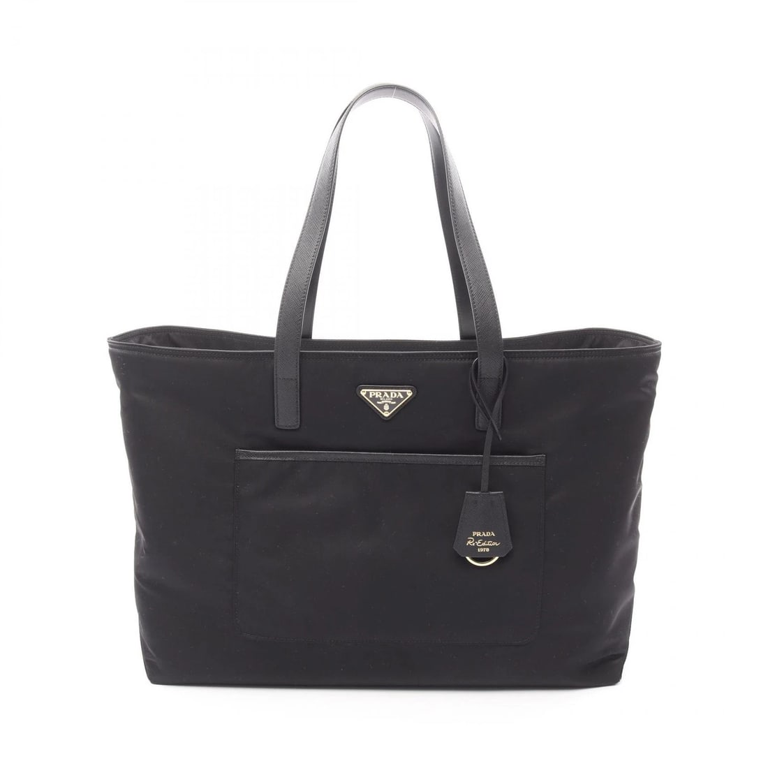 PRADA RE-EDITION TESSUTO SAFFIANO TOTE BAG NYLON LEATHER: PRADA Re-Edition Tessuto Saffiano Tote Bag Nylon Leather Brand: PRADA Type/Style: Tote Bag Material: Exterior Material Nylon and leather Color: Exterior Color Black?ish colors Size: H:31cm x W:42cm x 