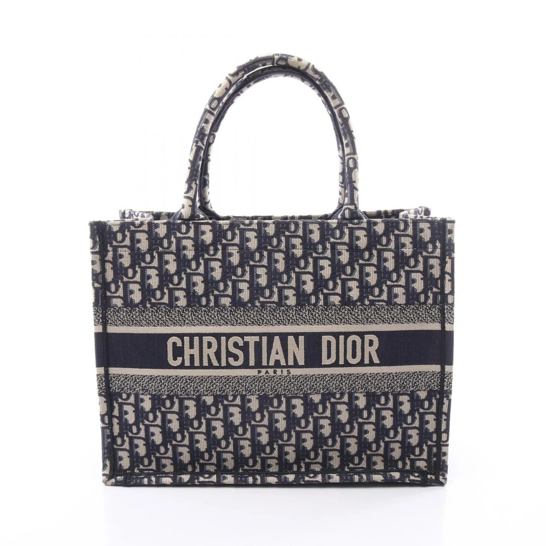 CHRISTIAN DIOR BOOK MEDIUM OBLIQUE EMBROIDERY HANDBAG: Christian Dior BOOK Medium Oblique Embroidery Handbag Brand: Dior Type/Style: Tote Bag Material: Exterior Material canvas Color: Exterior Color Navy?ish colors and Beige?ish colors Size: H:27cm x