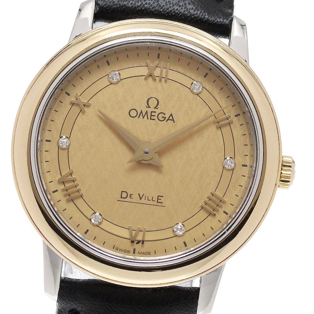 OMEGA DE VILLE PRESTIGE YELLOW GOLD BEZEL QUARTZ WATCH: OMEGA De Ville Prestige Yellow Gold Bezel Quartz Watch Brand: OMEGA Type/Style: Wristwatch Material: Band Material leather, Case Material Stainless Steel/K18YG Color: Band Color black, Case Color Silv