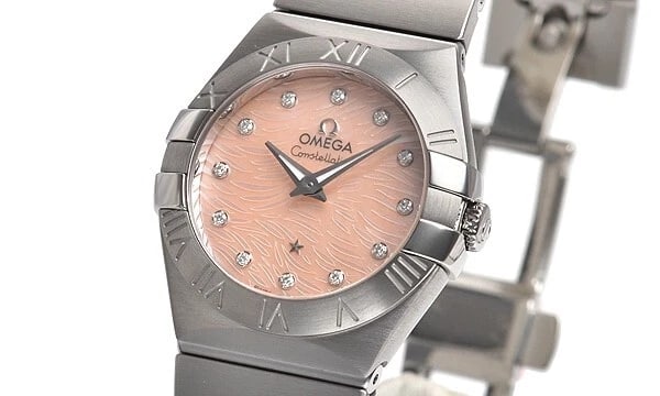 OMEGA CONSTELLATION BRUSHED QUARTZ PLUME WATCH: OMEGA Constellation Brushed Quartz Plume Watch Brand: OMEGA Type/Style: Wristwatch Material: Material (Main) Stainless Steel Color: Case Color Color Pink Size: Case Size 27.0mm Accessories: None