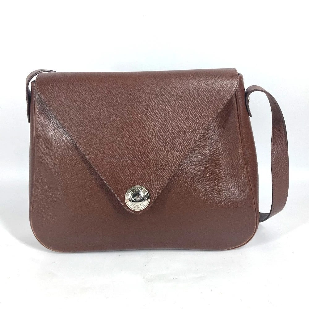 HERMES CHRISTIE RHONE BAG FLAP SHOULDER BAG: HERMES Christie Rhone bag flap Shoulder Bag Brand: HERMES Type/Style: Shoulder Bag Material: Leather Color: Brown / SilverHardware Size: W10.4?H10.8?D3.3inch / W26.5cm H27.5cm D8.5cm Accessories: