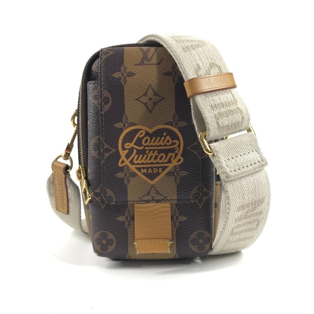 LOUIS VUITTON STRIPE NIGO COLLAB SHOULDER BAG: LOUIS VUITTON Stripe NIGO Collab Shoulder Bag Brand: LOUIS VUITTON Type/Style: Shoulder Bag Material: Monogram Canvas Color: Brownxbeige Size: W3.9?H6.7inch / W10cm H17cm Accessories: None