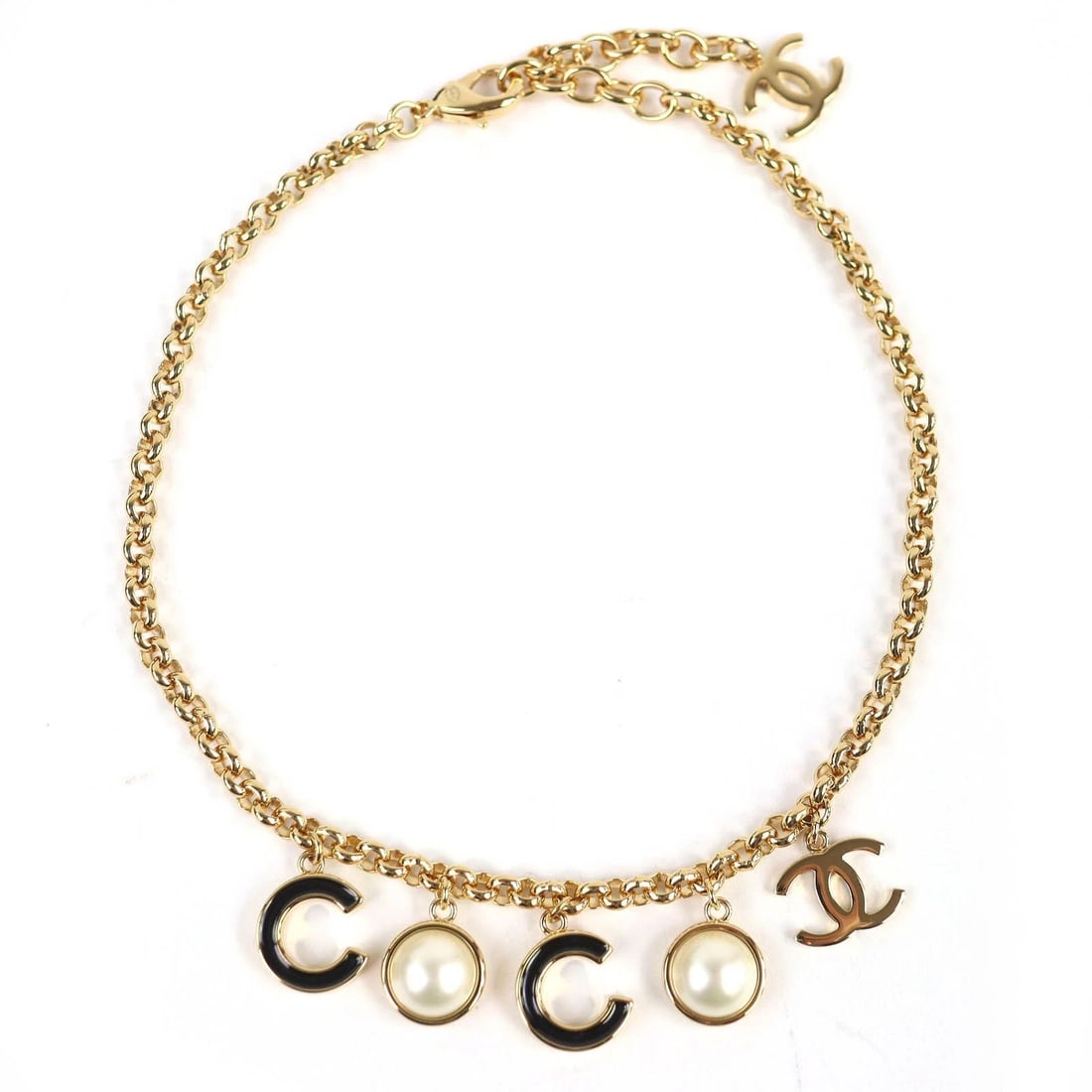 CHANEL COCO MARK PEARL GOLD/BLACK: CHANEL COCO Mark Pearl Gold/Black Brand: CHANEL Type/Style: Necklace Material: PEARL, Color: Gold/Black Size: Top Length: Approx. 2cm Top Width: Approx. 1.5cm, Minimum Neck Circumference: Approx. 36.5