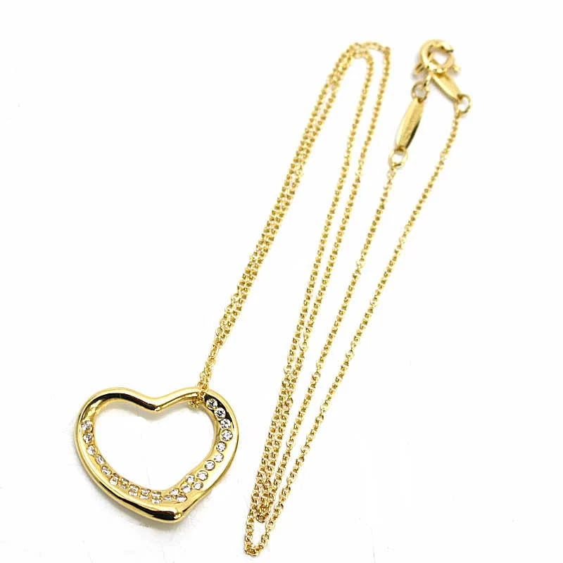 TIFFANY & CO. NECKLACE PENDANT DIAMONDS 18K YELLOW GOLD: Tiffany & Co. Necklace Pendant Diamonds 18K Yellow Gold Brand: Tiffany & Co. Type/Style: Pendant Material: 18K Yellow Gold, Main Stone/Creation NATURAL Color: YELLOW GOLD Size: Chain: approx. 40 cm; C